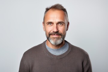 Obraz premium Portrait of a middle-aged man with gray hair and beard.