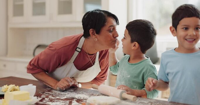 Bake, grandmother kiss or children in kitchen with siblings learning cooking recipe in family home. Love, education or happy grandma smiling or helping young kids for skills development together