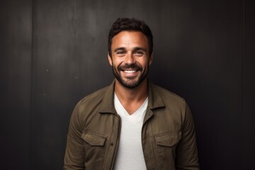 Fototapeta premium Portrait photography of a satisfied Brazilian man in his 30s wearing a chic cardigan against an abstract background 