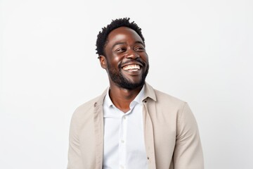 Obraz premium Cheerful african american man laughing over white background.