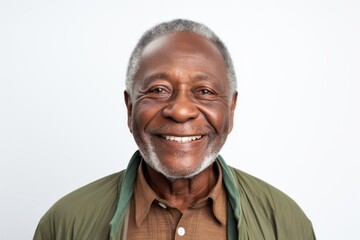 Portrait of happy senior african american man smiling against white background