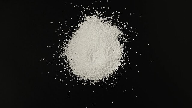 Pile of Sodium percarbonate powder. As an oxidizing agent, sodium percarbonate is an ingredient in number of home and laundry cleaning products, including non-chlorine bleach products.