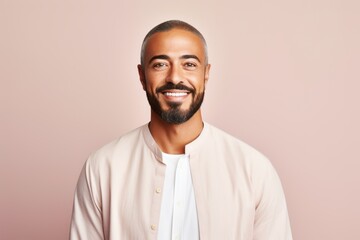 Portrait of a handsome young african american man smiling and looking at camera