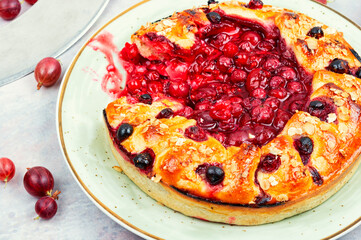 Open summer pie with berries.