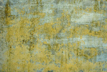 Background. Yellow stained and worn wall. Pattern.