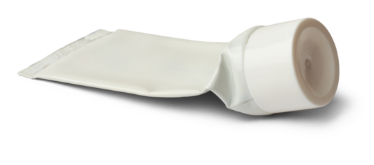 close-up of used empty tube with white cap, mock-up template for toothpaste, cream, gel or shampoo, blank package isolated on white background, medicine or cosmetics concept