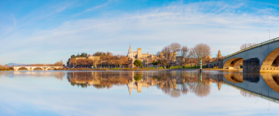 Pont Saint Benezet bridge on the Rhone River  and  Palace of the Popes ( Palais des Papes) and...