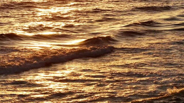 Ocean sunset on the golden waves