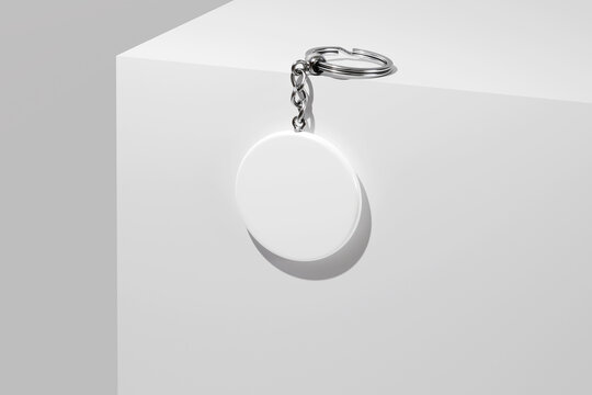 Hanging round keychain with key ring mockup. 3D rendering