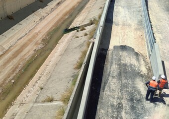 13.07.2023 Yarkon river dries up: small stream on the left is the level of Yarkon river during abnormal heat in Israel.