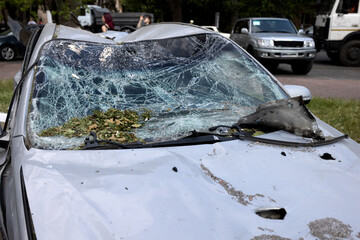 Crime Incident! Broken car windows as a result of a terrorist attack. Car robbery. Dangerous fatal...