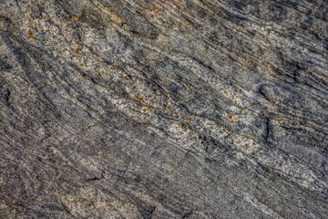 Background close-up rocky gray stone marble