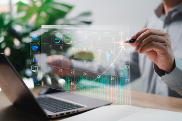 Business management and planning concept, Businessman show graph and indicators growth, and successful marketing strategic comprehensive business planning future success and development, calendar