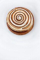 French dessert of flamed egg cream and lemon biscuit