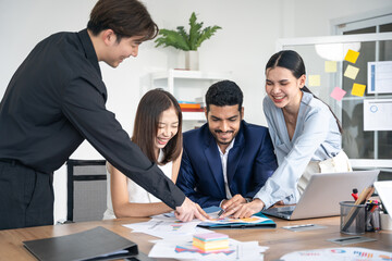 Asian business people discuss with new startup project Idea presentation, analyze planning and financial statistics and investment market at office.