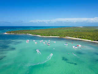 Aerial view of the yachts with tourists moored in beautiful lagoon with turquoise sea water of the...