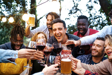 Friends Toasting at Countryside Gathering at Dusk - Diverse group of friends aged 20-40, toasting outdoors at a countryside house