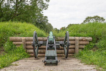 Fototapeta na wymiar The old cannon on the ramparts of Fredericia