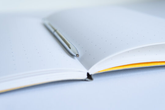 notebook with pen close up