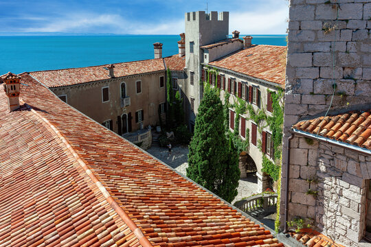 Gothic Duino castle on a cliff over the Gulf of Trieste (Adriatic sea), Italy.