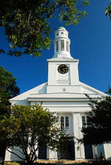 A beautiful classic white church graces a charming New England village