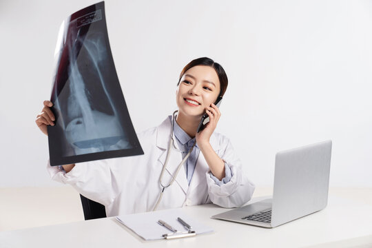 A young female doctor see x-rays