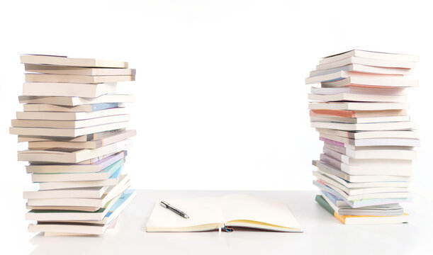 Textbooks stacked on the desktop