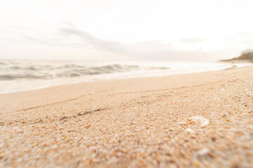 Fototapeta na wymiar evening empty sandy beach background