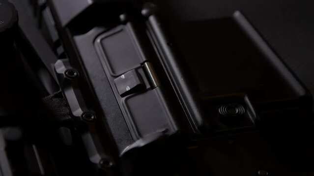 AP-15 close-up, lying on a table with a telescopic sight