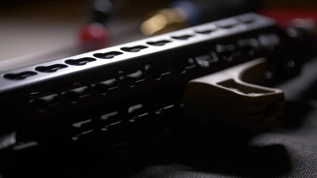 AP-15 close-up, lying on a table with a telescopic sight