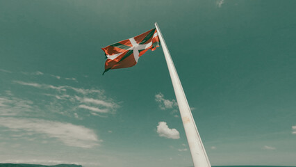 Basque flag and blue sky - obrazy, fototapety, plakaty