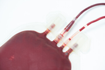 Blood pack for transfusion from donor.Full blood bag for accident's patient on white background in...