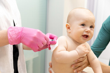 Health care concept. Baby's vaccination at hospital