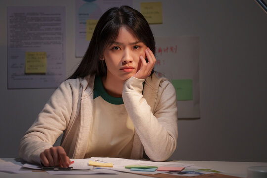 Tired female college student