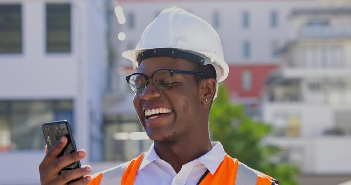 Construction worker, happy with phone and typing a communication, email or meme on internet, online connection or social media. Black man, engineer or contractor laughing and reading on cellphone