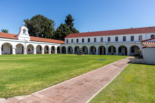 OCEANSIDE, CALIFORNIA, USA - SEPTEMBER 3, 2021: Part of the quadrangle of Mission San Luis Rey founded in 1798. During the mission era, bullfights were held in the quadrangle.