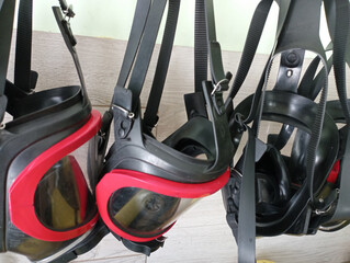 A storage place for individual firefighter breathing protection masks.