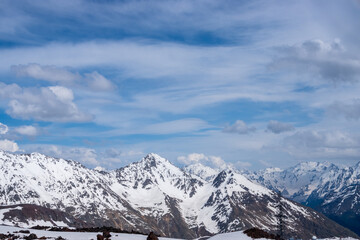 Black volcanic mountains in the snow