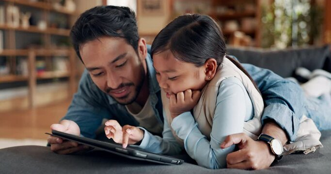 Father, tablet and happy kid in home living room, streaming movie or video of cartoon for bonding. Technology, smile and girl with dad on sofa to scroll social media, gaming app or browsing internet.