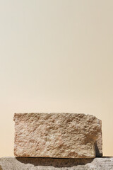 Natural stones stage podium on beige background. Minimal empty display product presentation scene....
