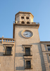 Fototapeta na wymiar Clock tower in Alicante old town, Spain