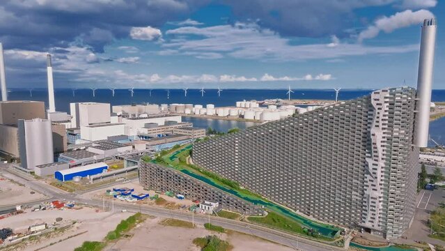 Amager Bakke, Amager Hill or Amager Slope or Copenhill - a heat and power waste-to-energy plant and a sports park in Amager, Copenhagen, Denmark. ESG green energy.