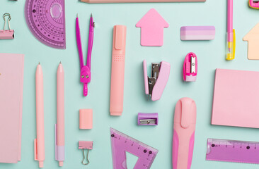 Pattern with pink school stationery on color backgroung, top view