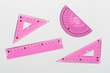 Set of transparent rulers on color backgroung, top view