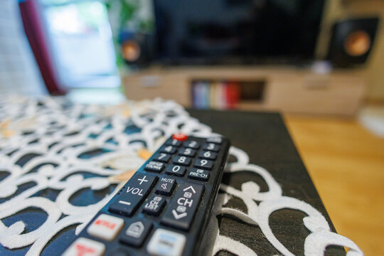 tv remote control on a table