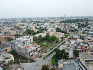 Fototapeta na wymiar Non edited original high angle view of residential area with drone of cantt Lahore, Pakistan.