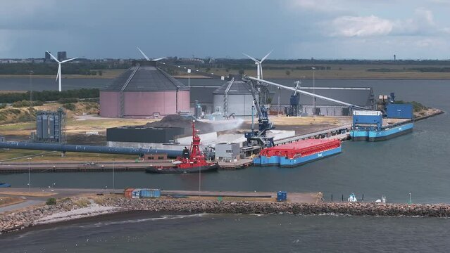 Coal factory in Copenhagen, Denmark. Ships bringing coal to the electrical power plant.