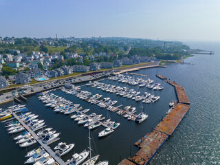 Borden Light Marina aerial view on the Taunton River with Fall River modern city skyline at the...