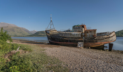 Abandoned fish trawler on the shore of Loch Linnhe.