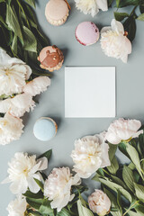 Greeting card with place for your text and white peonies top view